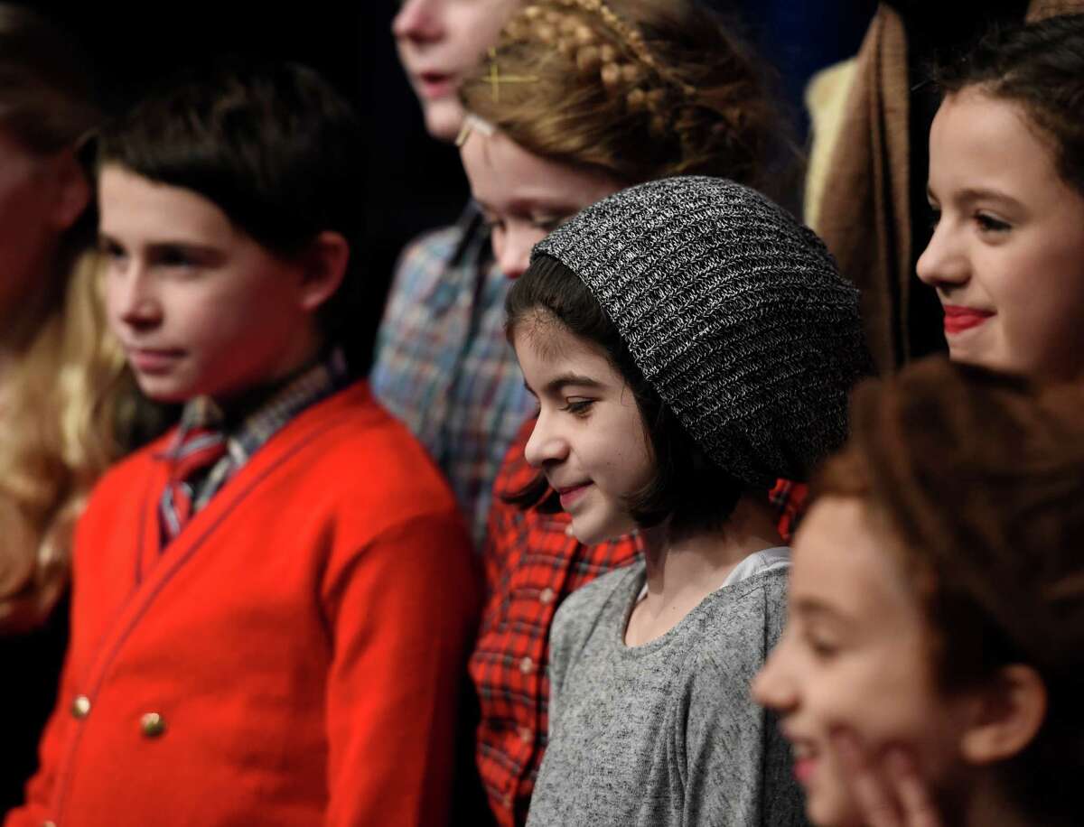Broadway actor Gabriella Pizzolo, center, visits Capital Repertory Theater on Friday Dec. 11, 2015 to her friends who are appearing in production of "A Christmas Story, The Musical" in Albany, N.Y. (Skip Dickstein/Times Union)