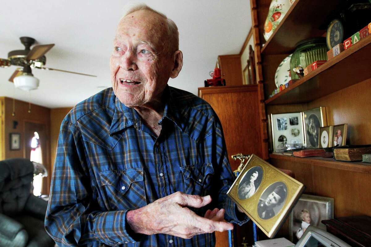 Earl Parker (shown at home in Shriner last year), served in the Army's European theater during World War II.