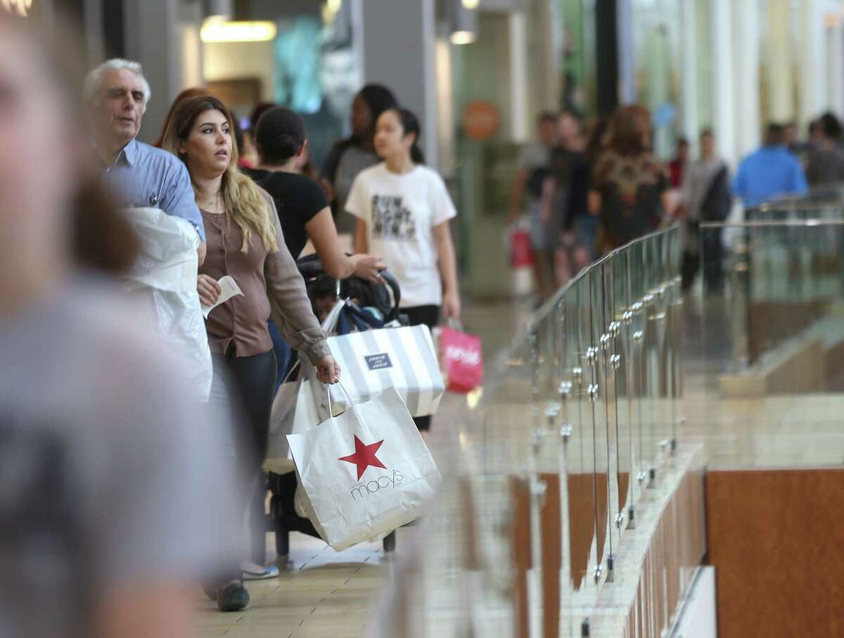Shoppers walk the hallways of the Galleria