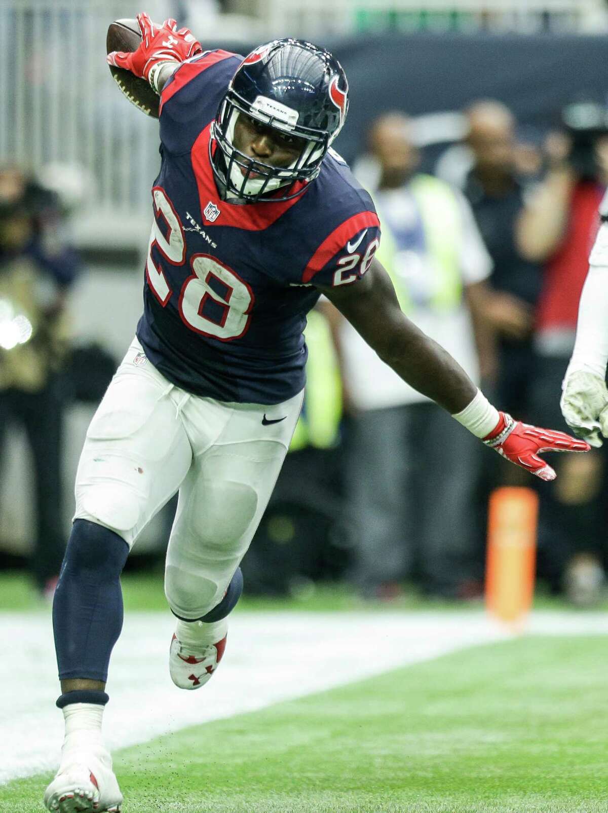 Houston Texans running back Alfred Blue (28) celebrates after making a 21-yard touchdown reception on a pass from Cecil Shorts during the third quarter against the New York Jets of an NFL football game at NRG Stadium on Sunday, Nov. 22, 2015, in Houston. ( Brett Coomer / Houston Chronicle )