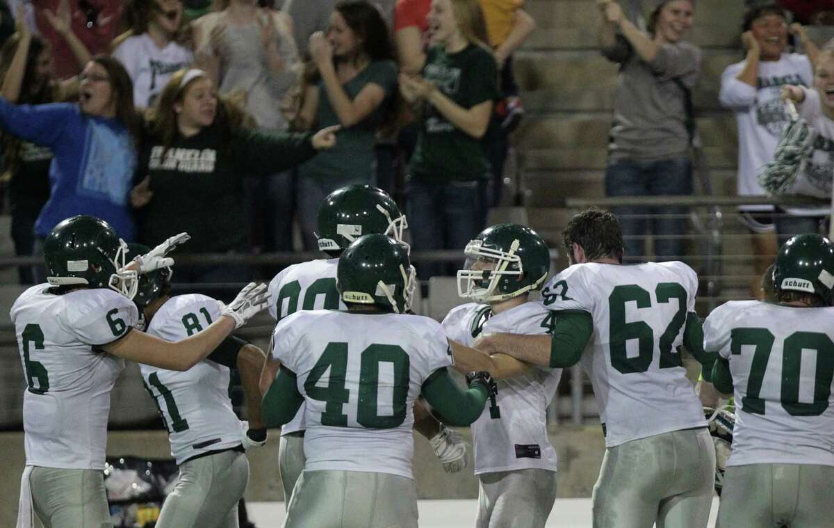 Franklin tailback Jacob Dorsett, center, is congratulated by teammates after kicking the field goal that lifted the Lions to victory with 15 seconds remaining.