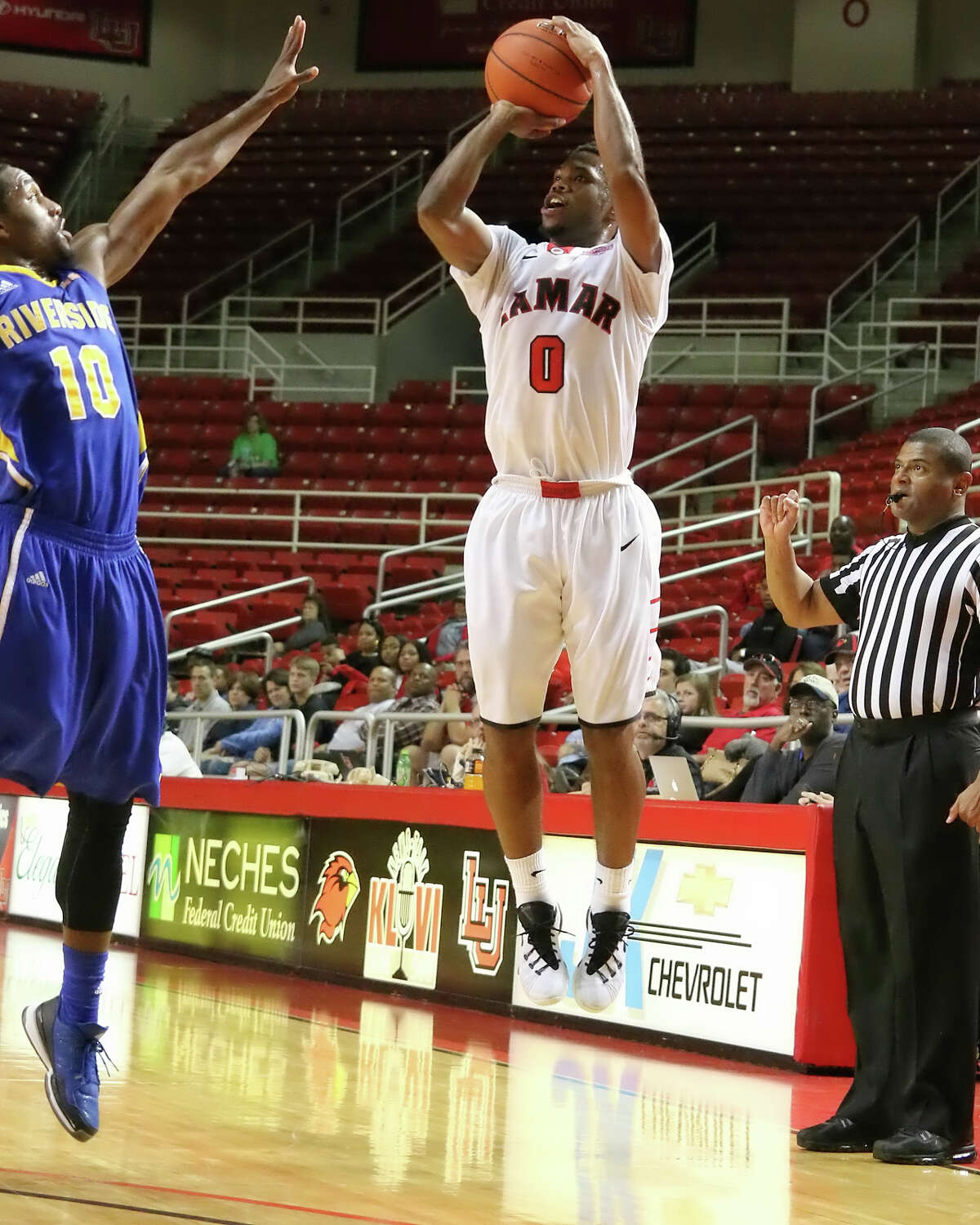 Kevin Booze takes a shot during the game between the Lamar Cardinals and University of California Riverside Highlanders at the Montagne Center Sunday, November 29, 2015 - photo provided by Kyle Ezell