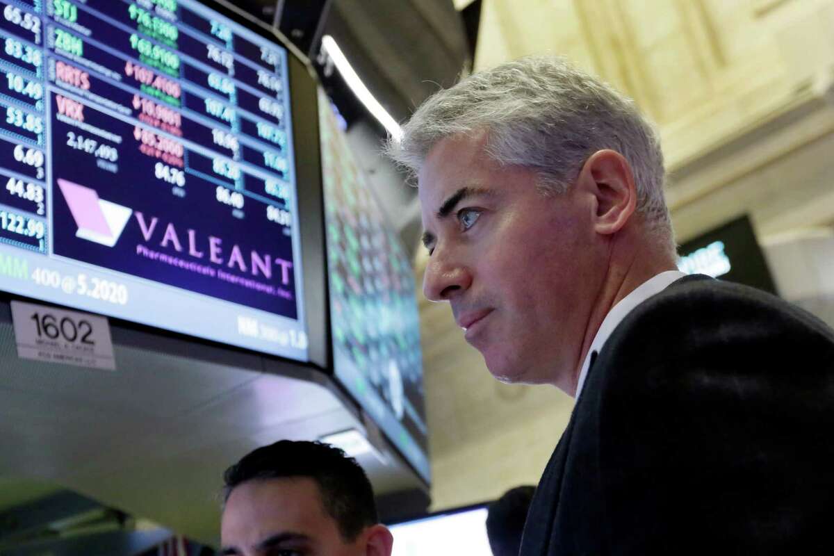 FILE - In this Nov. 10, 2015 file photo, Bill Ackman, CEO and founder of Pershing Square Capital and Valeant Pharmaceuticals' second largest shareholder, visits the company's trading post on the floor of the New York Stock Exchange. Ackman is one of the better-known activist investors because his campaigns are so aggressive and because he often makes his case publically. (AP Photo/Richard Drew) ORG XMIT: NY118