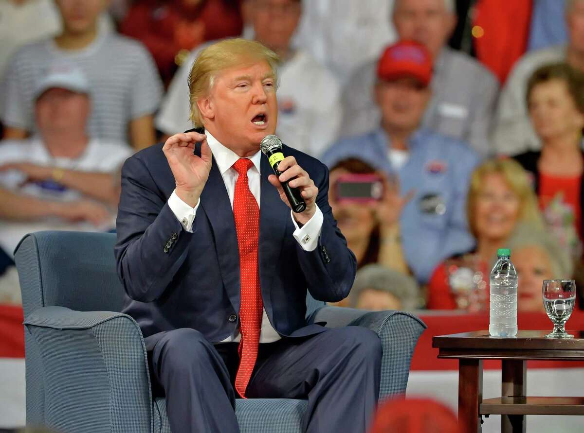 Republican presidential candidate Donald Trump speaks at a town hall meeting in the Convocation Center on the University of South Carolina Aiken campus Saturday, Dec. 12, 2015, in Aiken, S.C. (AP Photo/Richard Shiro)