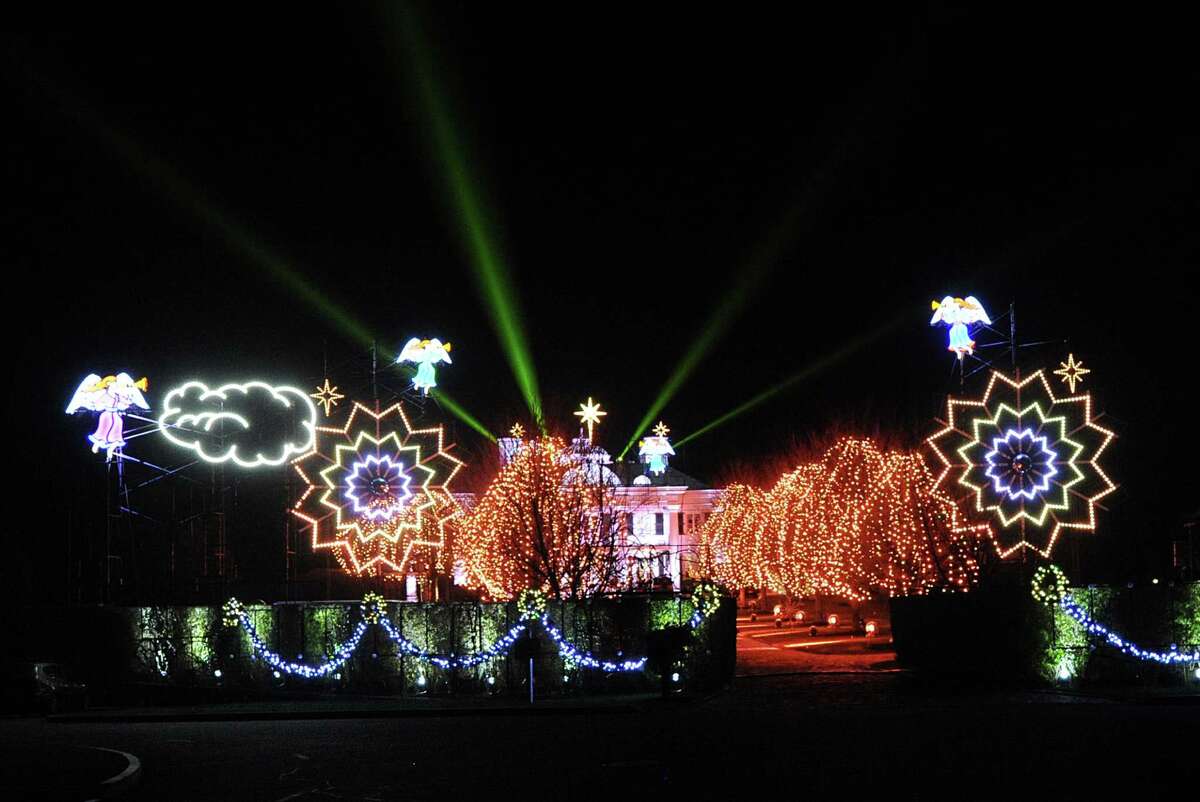 After going dark last year, the traditional holiday light show extravaganza is back at the Belle Haven mansion of Paul Tudor Jones II in the Belle Haven section of Greenwich, Conn., Thursday night, Dec. 10, 2015.