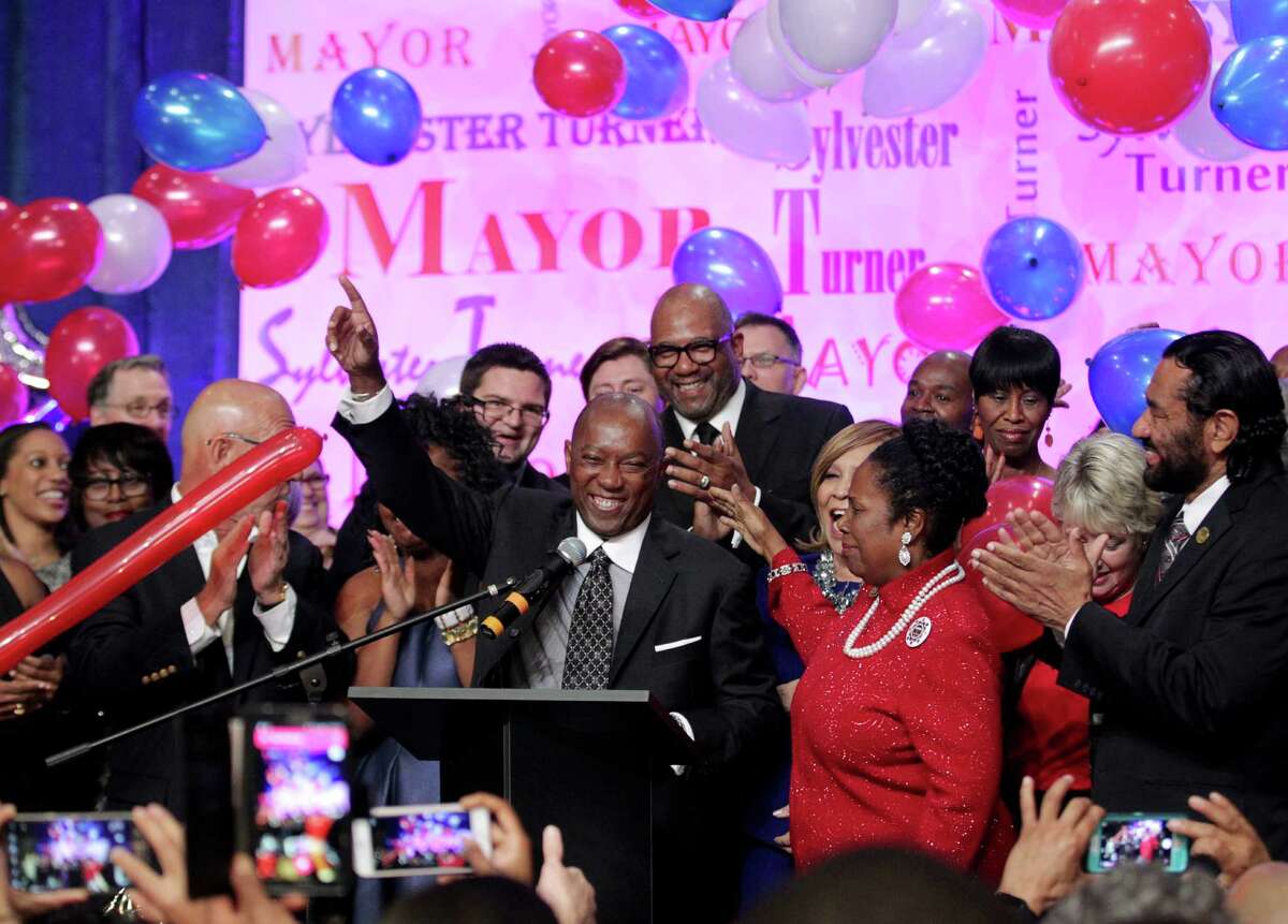 Mayor-elect Sylvester Turner celebrates his victory at his election night watch party at the George R. Brown Convention Center, Saturday, Dec. 12, 2015, in Houston.