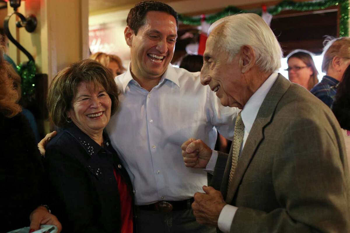 Texas State Representative Trey Martinez Fischer, center, greets Dr. William Elizondo and his wife, Maria Oralia, before Martinez Fischer announces his candidacy for Texas Senate District District 26, Sunday, Dec. 13, 2015. For a second time, Martinez Fischer will face off with Sen. Jose Menendez for the seat vacated by Leticia Van De Putte. Menendez won the special election for the vacated seat in February of this year.