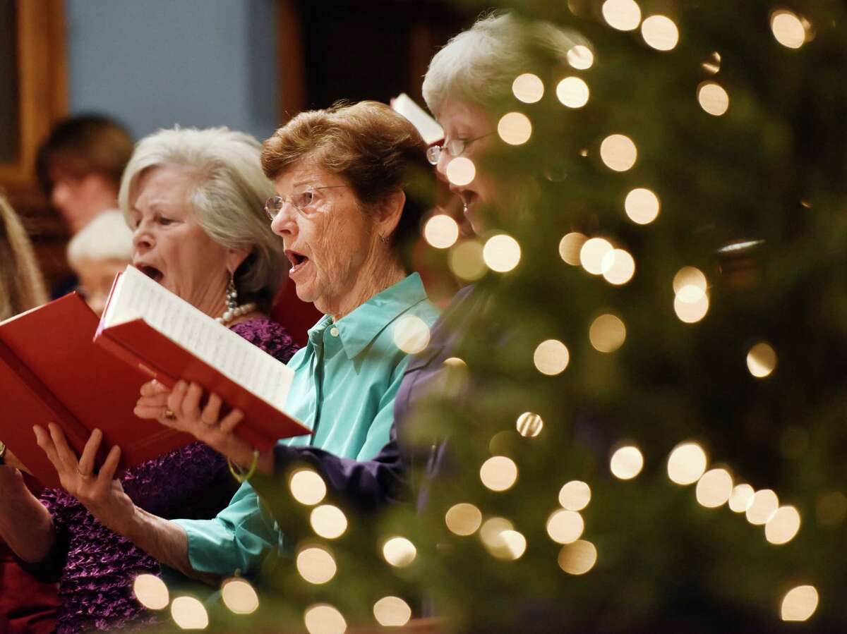 Nancy Pearson and other members of the First Church Festival Chorus sing during the annual holiday performance of Handel’s “Messiah” at First Congregational Church of Greenwich on Sunday.