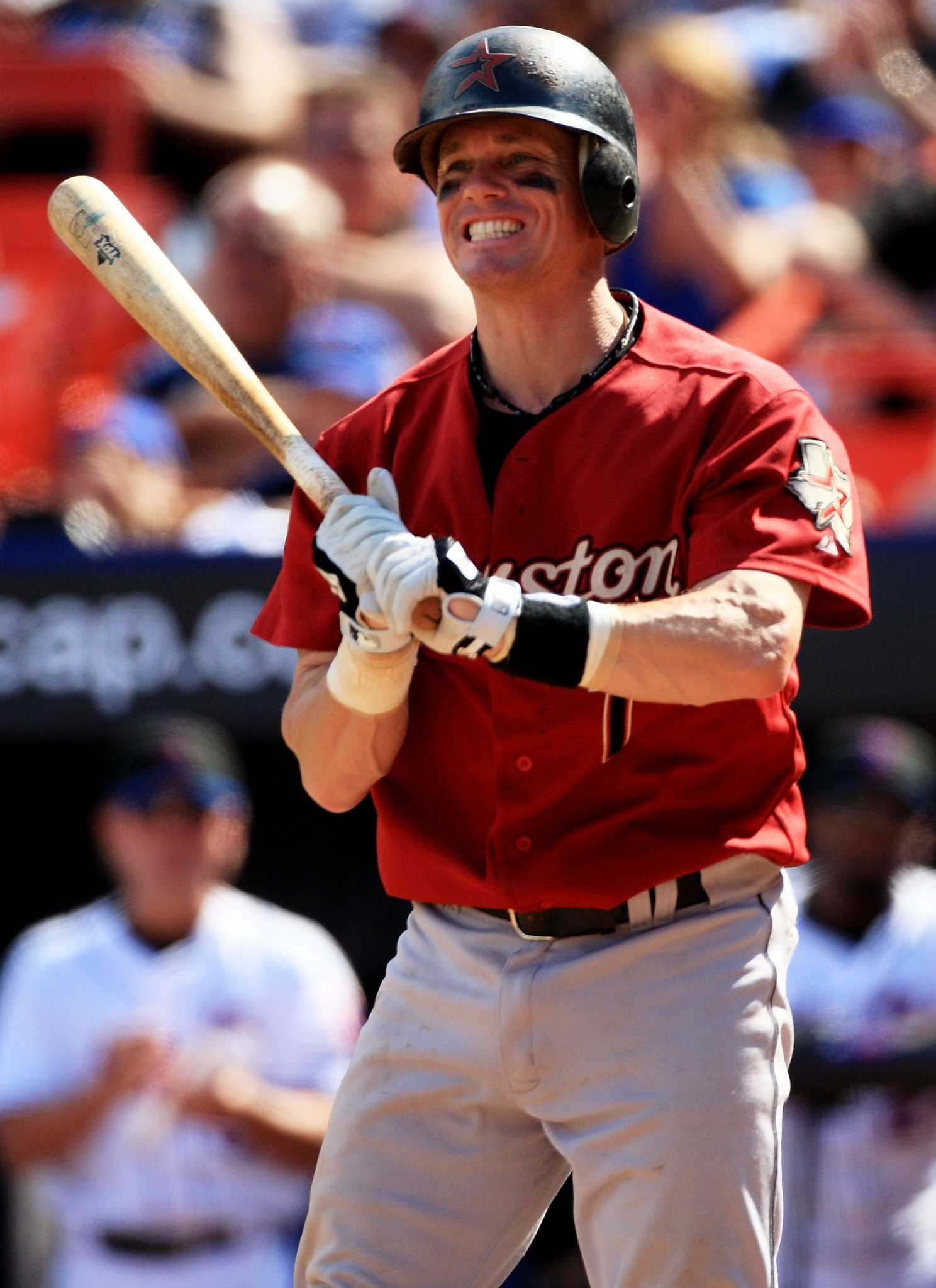 Houston Astros second baseman Craig Biggio (R) celebrates his