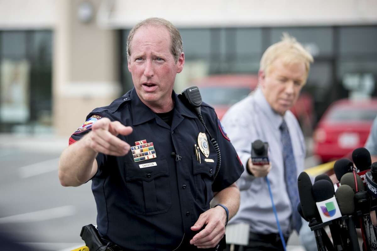 Sgt. Patrick Swanton, a spokesman for the Waco Police Department, speaks at a news conference the day after a shootout between rival motorcycle gangs broke our in front of Twin Peaks in Waco, Texas, May 18, 2015. Swanton said police charged about 170 people on Monday in the shootout that left at least nine bikers dead and 18 others wounded. (Ilana Panich-Linsman/The New York Times)