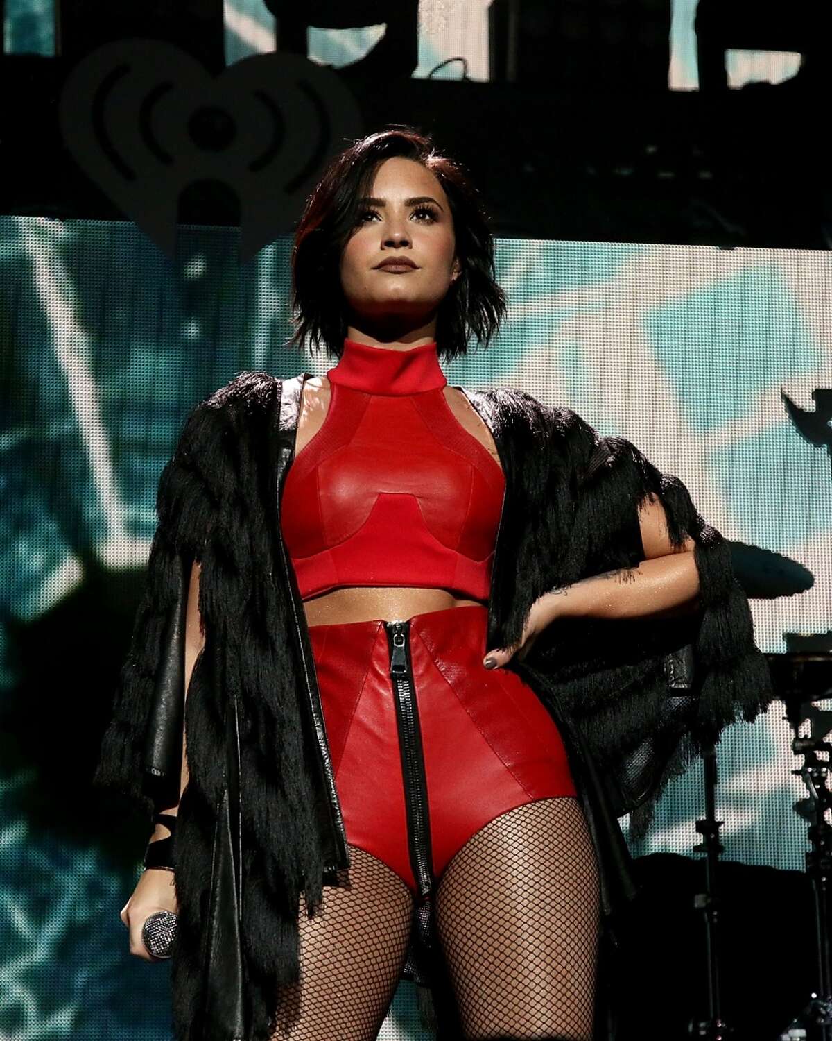 Demi Lovato performs at the iHeart Radio 106.1 KISS FM Jingle Ball at the American Airlines Center on December 1, 2015 in Dallas, Texas.