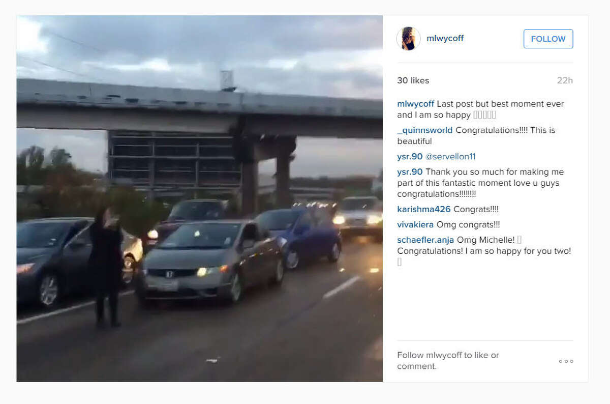 A video posted on Instagram on Sunday, Dec. 14, 2015, showed a man proposing to a woman on Interstate 45 near downtown Houston while others blocked traffic. (mlwycoff on Instagram)