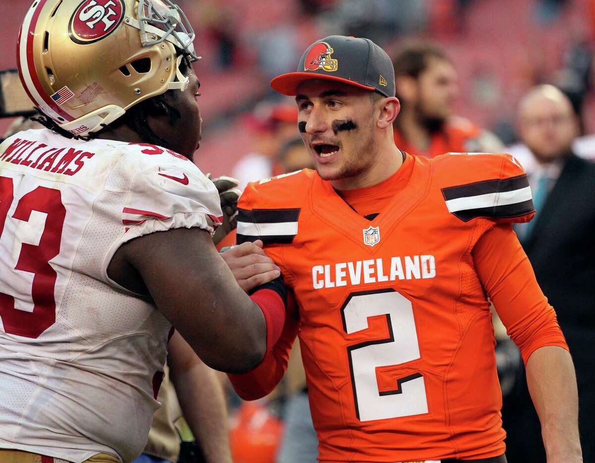 Cleveland Browns quarterback Johnny Manziel talks with San Francisco 49ers defender Ian Williams after Cleveland beat San Francisco 24-10.