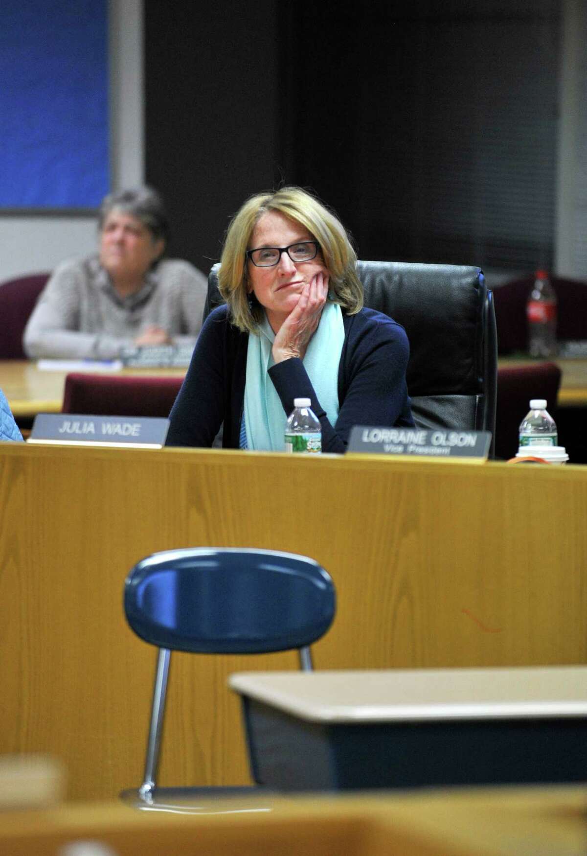 Former Board of Education member Julia Wade listens to a resident appeal for resignation at an October board meeting.
