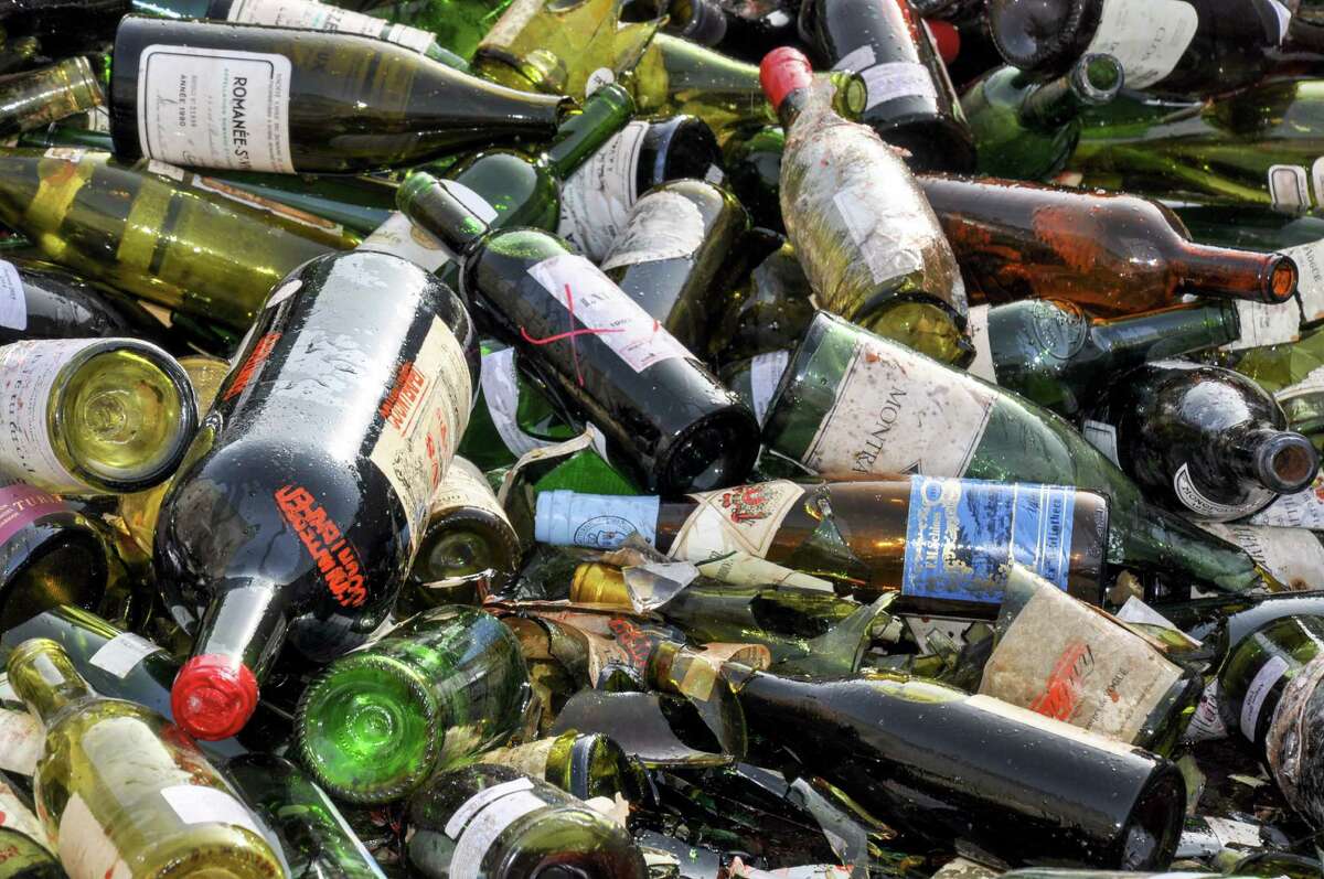 Photos U.S. Marshals destroy 500+ bottles of counterfeit wine at