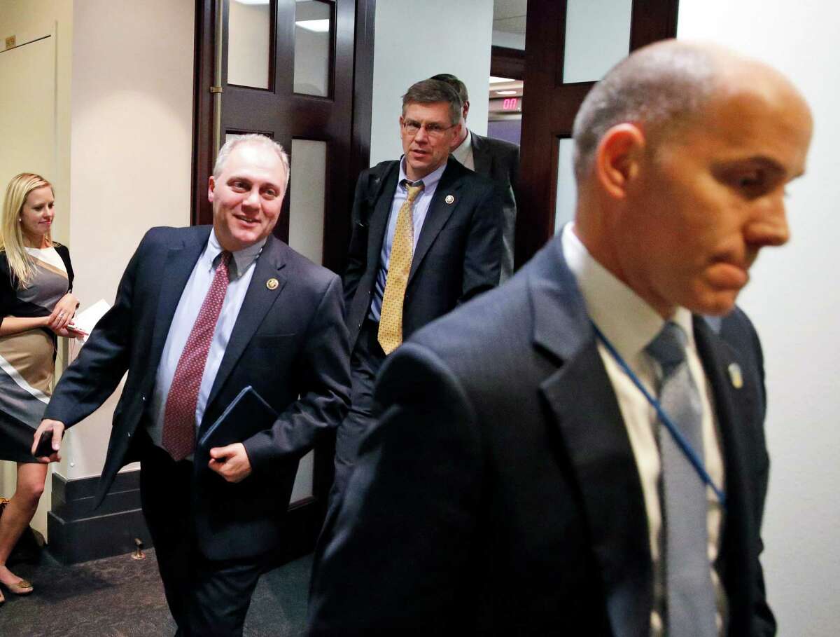 Rep. Steve Scalise, R-La., left, keeps introducing anti-carbon tax resolutions, making it harder for Republicans to change their minds.