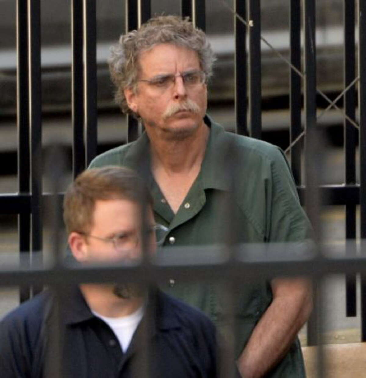 Eric J. Feight of Stockport, N.Y., leaves the Federal Courthouse in shackles after his bail was revoked Thursday afternoon, June 20, 2013, in Albany, N.Y. (Skip Dickstein/Times Union)