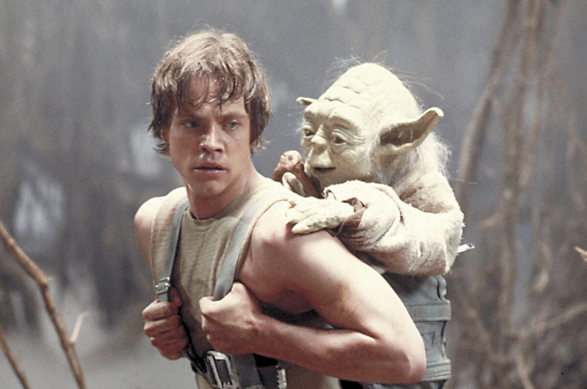 FILE - This 1980 publicity image originally released by Lucasfilm Ltd., Mark Hamill as Luke Skywalker and the character Yoda appear in this scene from "Star Wars Episode V: The Empire Strikes Back." The Library of Congress announced early Tuesday Dec. 28, 2010 that the film will be preserved by the Library of Congress as part of its National Film Registry. (AP Photo/Lucasfilm Ltd)