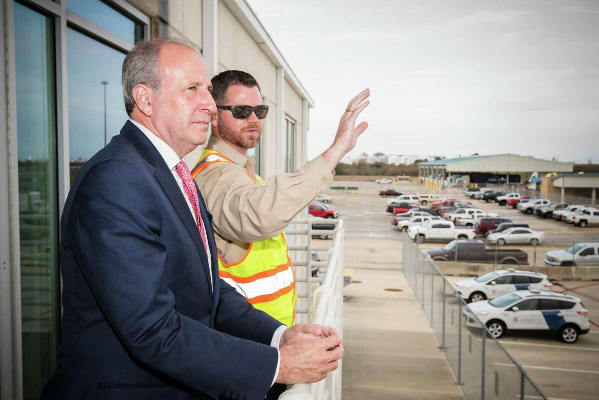 U.S. Ambassador to New Zealand Mark Gilbert, left, and Bryan Seitz of the Port of Houston Authority look over the Bayport container terminal Wednesday.