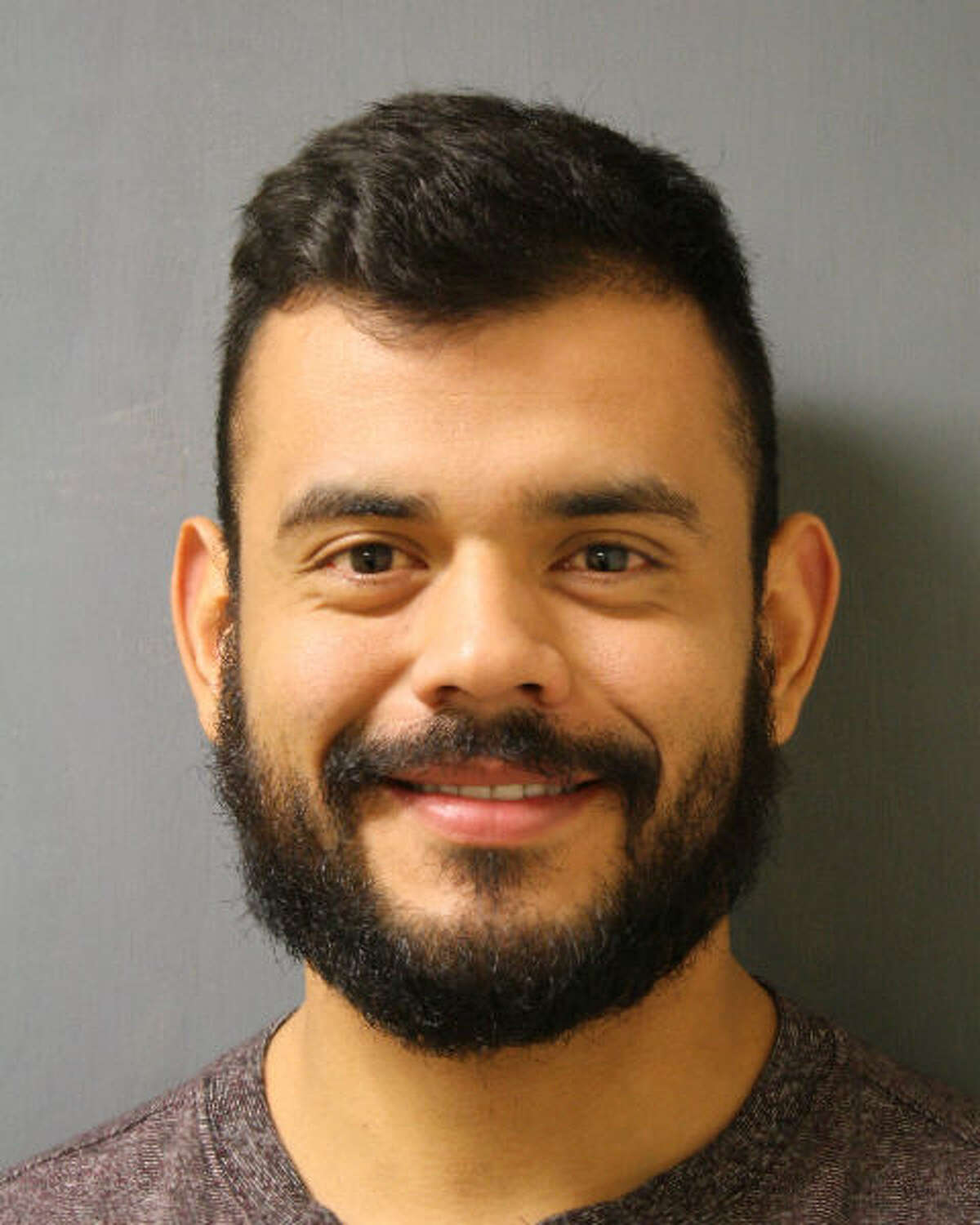 Vidal Valladares' mugshot in connection with his obstruction of roadway charge after her blocked traffic on I-45 on Sunday to propose to his girlfriend.