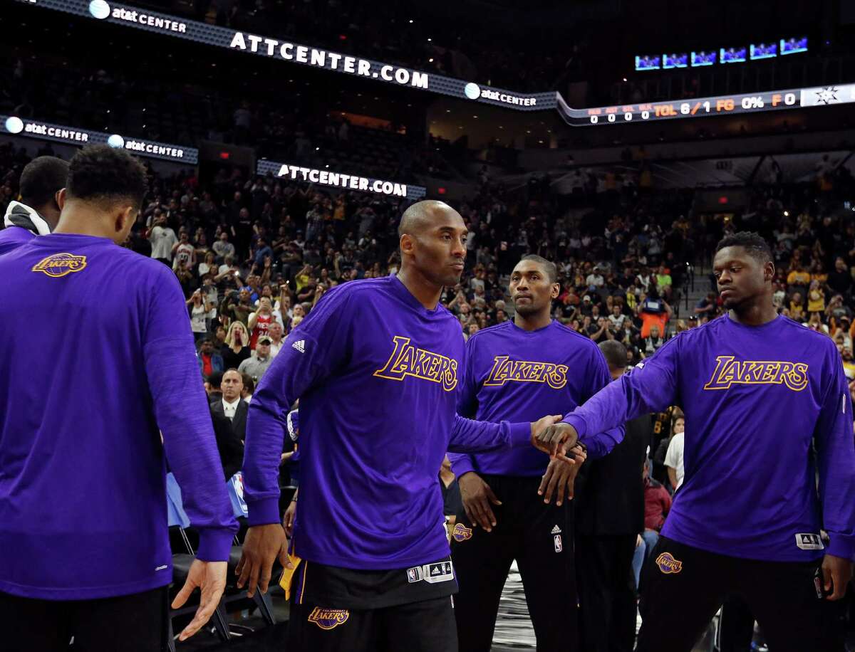 Los Angeles Lakers' Kobe Bryant is introduced before the game with the San Antonio Spurs Friday Dec. 11, 2015 at the AT&T Center.