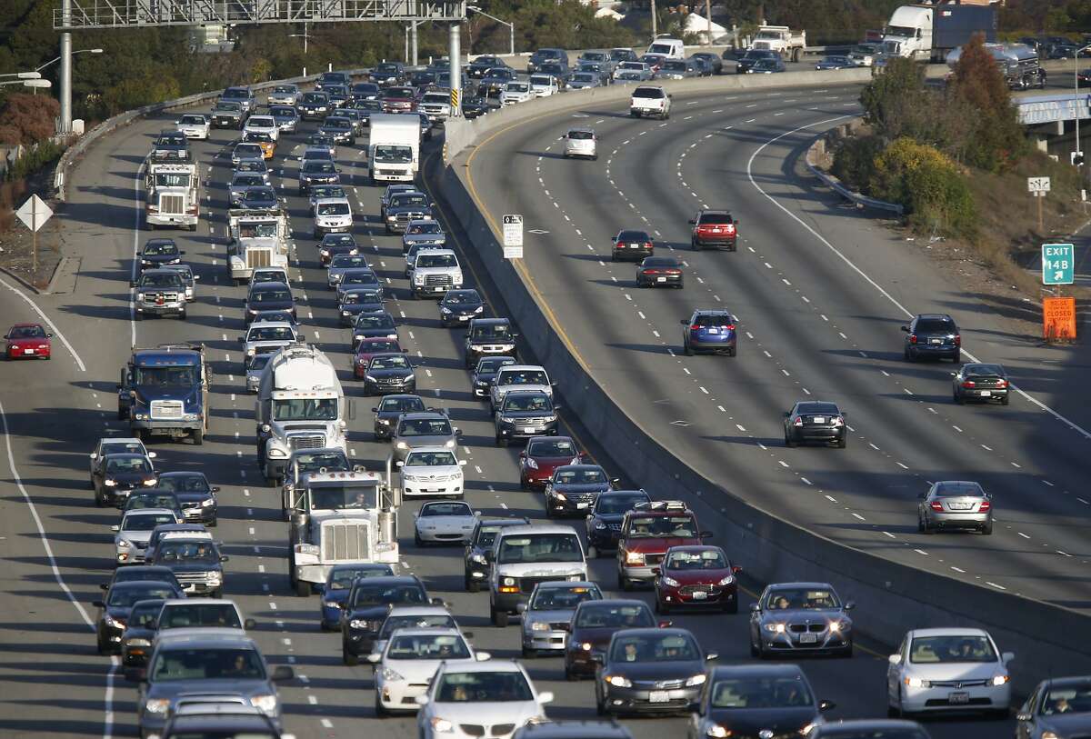 Westbound traffic rolls slowly down Interstate 80 near Carlson Boulevard during the morning commute in Richmond, Calif. on Thursday, Dec. 17, 2015.