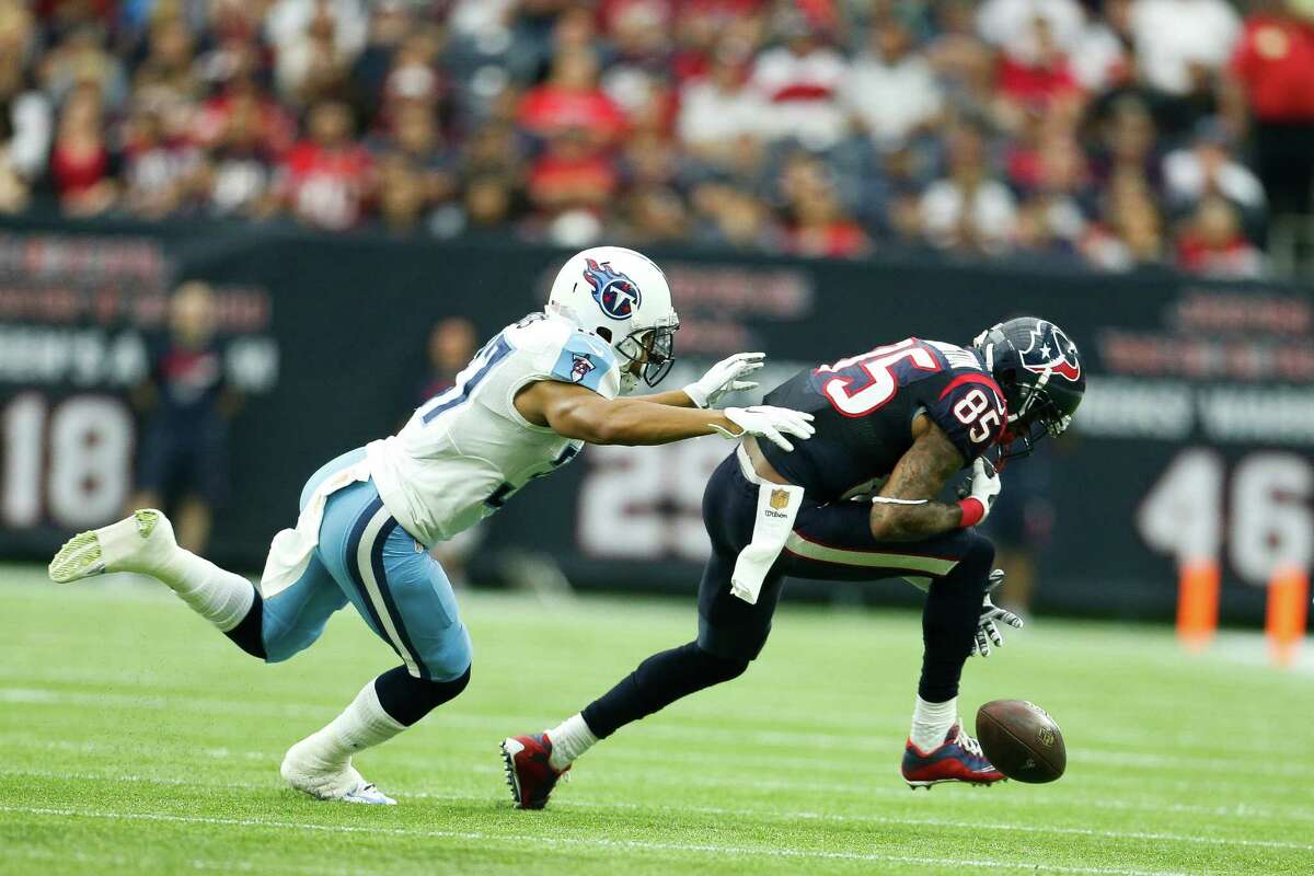 Depending on the source, the Texans either lead the league with 28 drops or are tied for second with 27. Wide receiver Nate Washington (85), defended here by Titans cornerback Cody Riggs, has a team-high six.