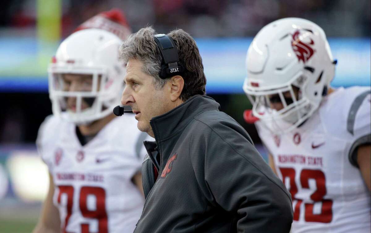 Washington State head coach Mike Leach stands on the sidelines in a game against Washington on Nov. 27, 2015, in Seattle.