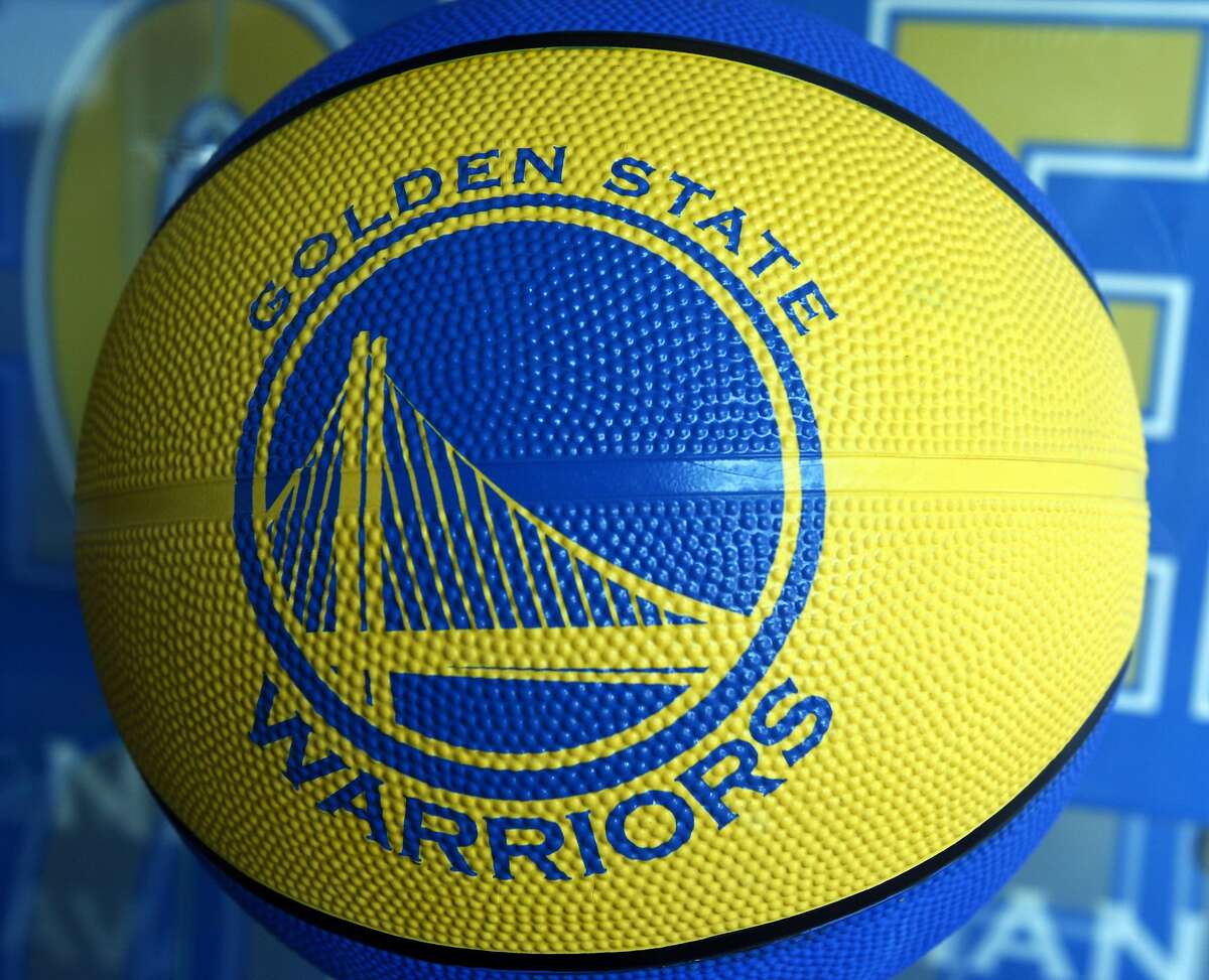 The Golden State Warriors logo is seen on a basketball for sale at the Warrior team store Wednesday, July 14, 2010, in Oakland, Calif.