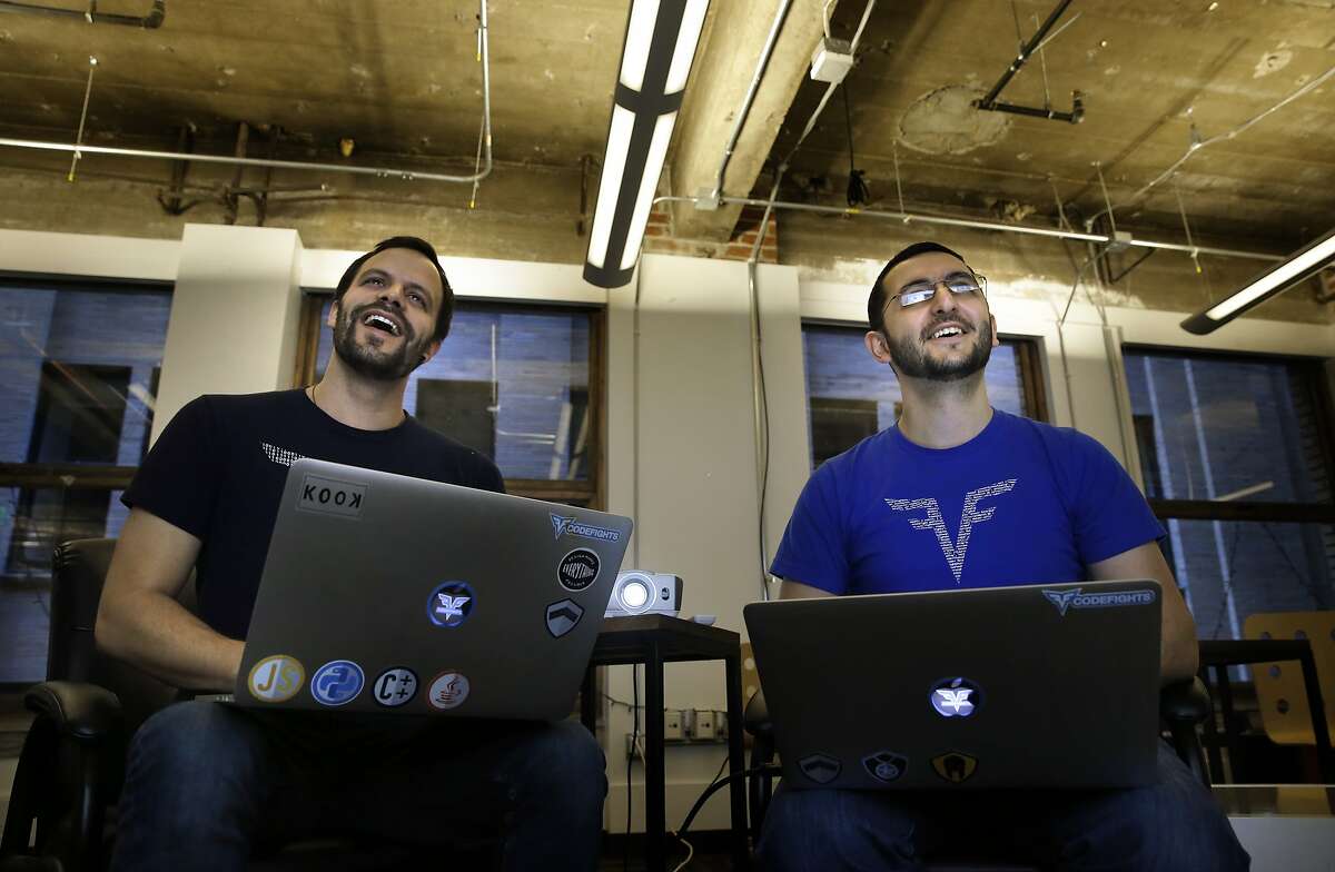 Co-founders of CodeFights Felix Desroches, (left) and Tigran Sloyan at their downtown San Francisco, Calif. office on Saturday December 19, 2015. They are the creators of Codefights an online programming puzzle test for applicants who are applying for jobs at companies like Go Daddy, Uber and Dropbox to name just a few.