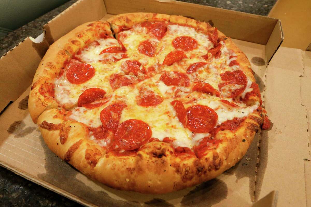 Pepperoni pizza from Angelo's, 1053 Austin Hwy, delivered to reporter Richard Webner on Friday, Dec. 11, 2015. MARVIN PFEIFFER/ mpfeiffer@express-news.net