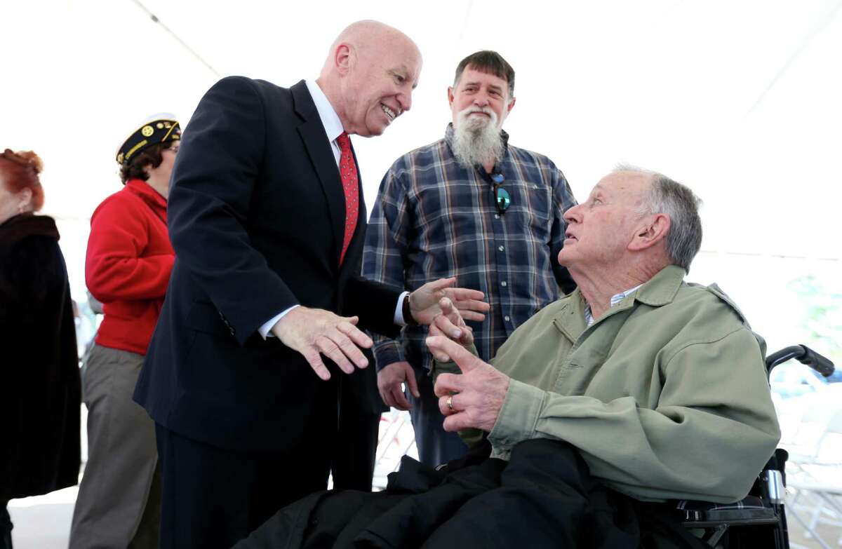 U.S. Rep. Kevin Brady meets with veterans at a ribbon-cutting ceremony for a new Veterans Affairs clinic he helped bring to his district.﻿