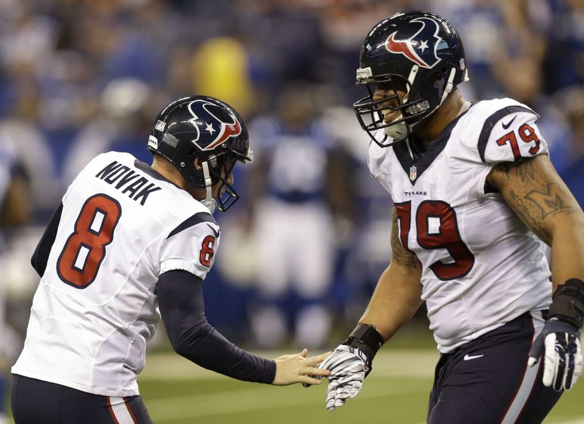 Houston Texans kicker Nick Novak (8) slaps hands with Houston Texans guard Brandon Brooks (79) after Novak hit a 32-yard field goal during the fourth quarter against theIndianapolis Colts at Lucas Oil Stadium on Sunday, Dec. 20, 2015, in Indianapolis. The Texans beat the Colts 16-10, for the Texans' first win in Indianapolis in franchise history. ( Brett Coomer / Houston Chronicle )