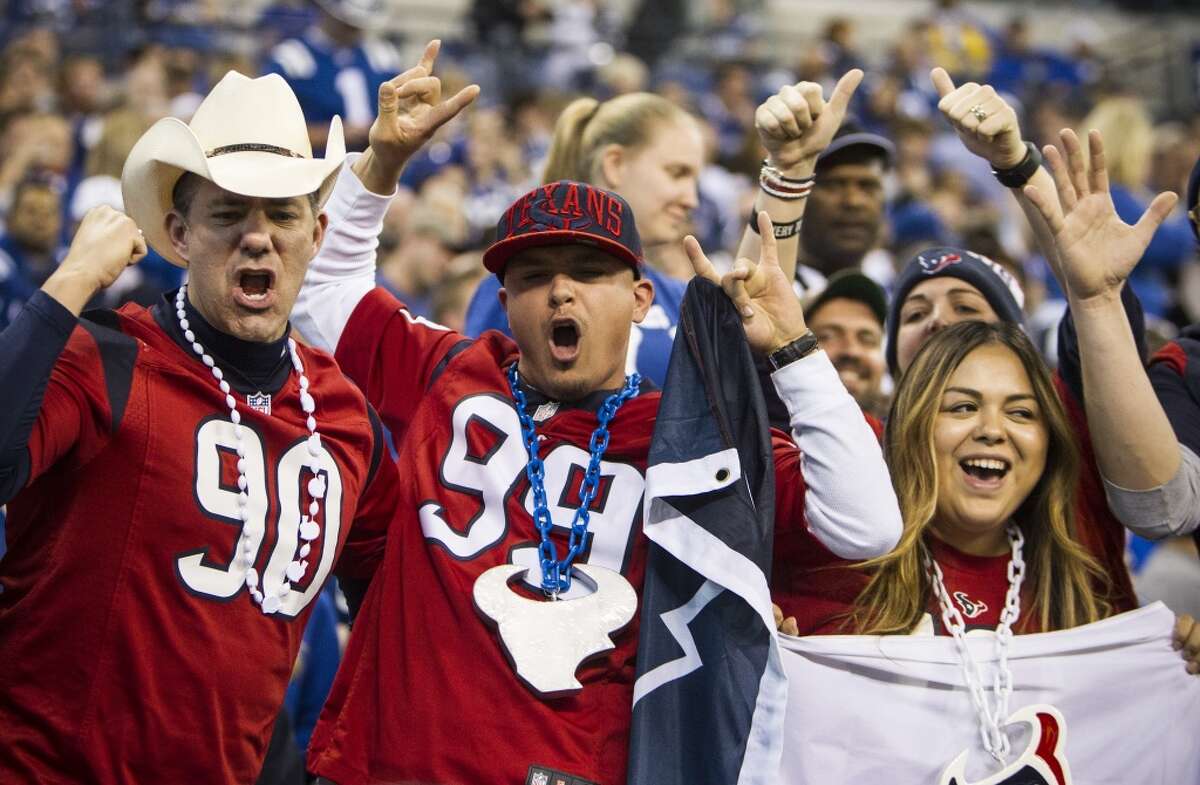 Houston Texans fans cheer after an 8-yard touchdown reception by Texans wide receiver Jaelen Strong against the Indianapolis Colts during the fourth quarter of an NFL football game at Lucas Oil Stadium on Sunday, Dec. 20, 2015, in Indianapolis. The Texans beat the Colts 16-10, for the Texans' first win in Indianapolis in franchise history. ( Brett Coomer / Houston Chronicle )