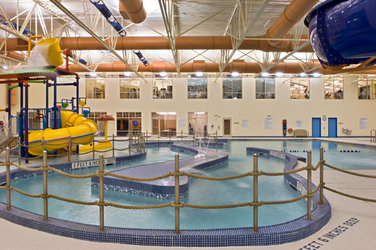 A photo of the aquatic center at the Rudy. A. Ciccotti Family Recreation Center. The image shows the ductwork on the ceiling. Some of it came down Tuesday March 26, 2013, a suspected failure of the cables holding them up. (Photo from the center's website)