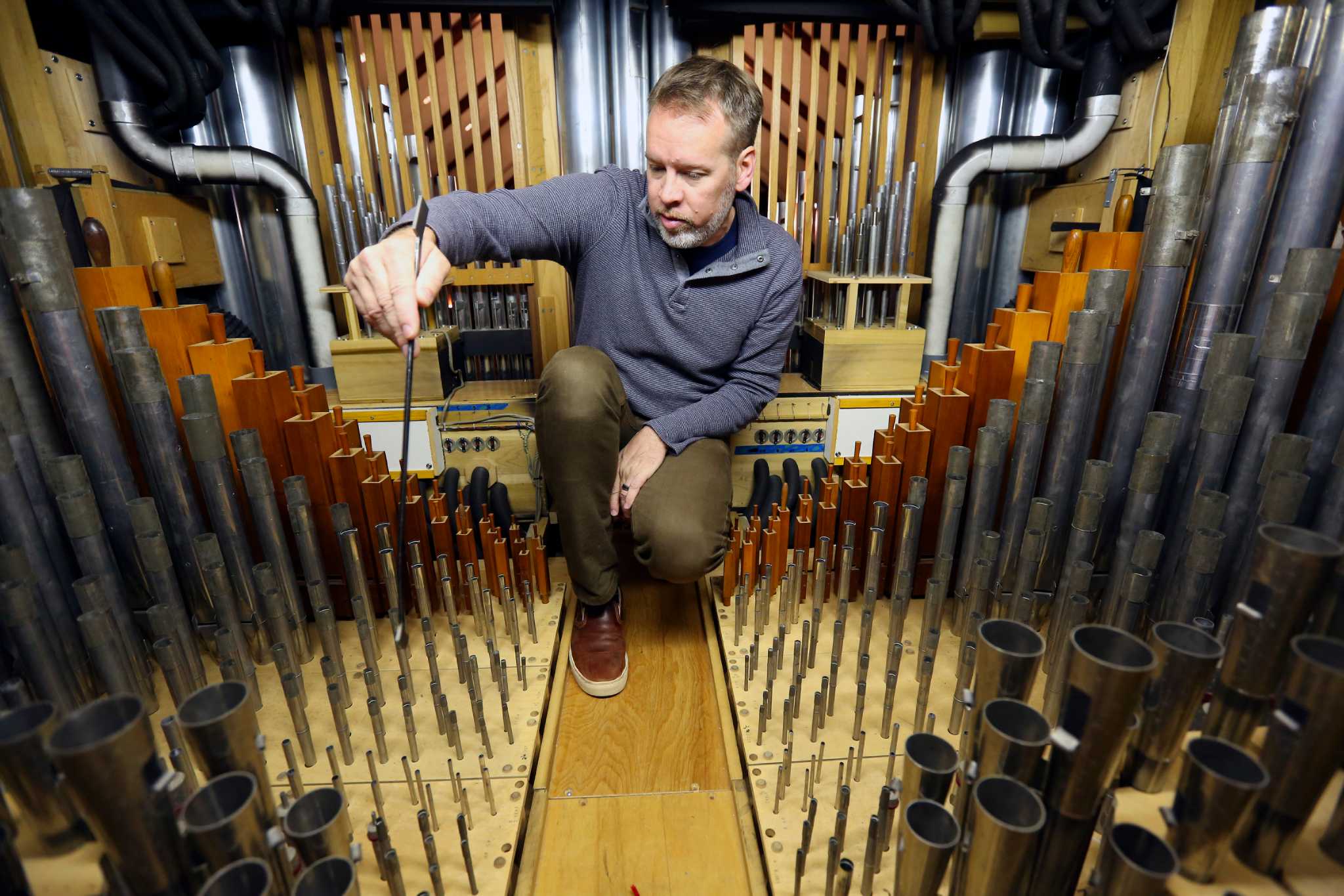 Pipe organ builder keeps S.A.’s grand instruments in tune
