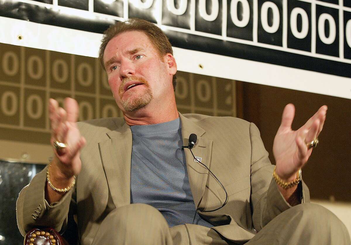 FILE - In this June 23, 2006, file photo, former Boston Red Sox player Wade Boggs talks in Providence, R.I. Boggs' No. 26 will be retired by the Red Sox. Boston said Monday, Dec. 21, 2015, it will retire the number of the Hall of Fame third baseman during a ceremony at Fenway Park on May 26, 2016, when the number will be added to the ballpark's right-field facade. (AP Photo/Stew Milne, File)