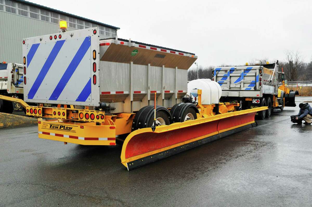 A view of the new Tow Plow attached to a plow truck, that will be used this year by New York State DOT for clearing snow off the roads. The trailer with an additional plow allows a driver to clear snow from two lanes at once. (Paul Buckowski / Times Union)