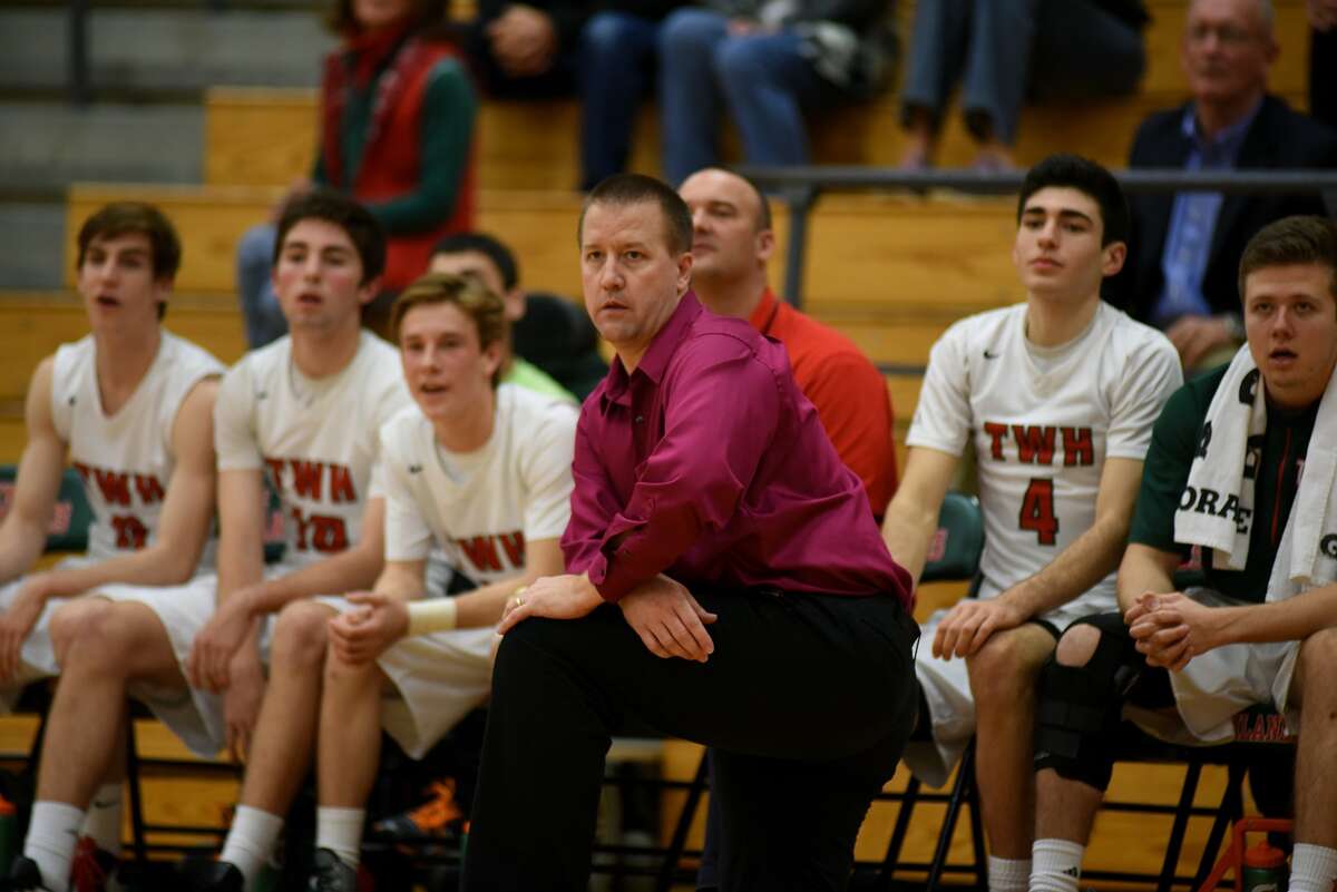 The Woodlands head coach Dale Reed, center, watches his team play against Clear Falls during their non-district match-up last week.