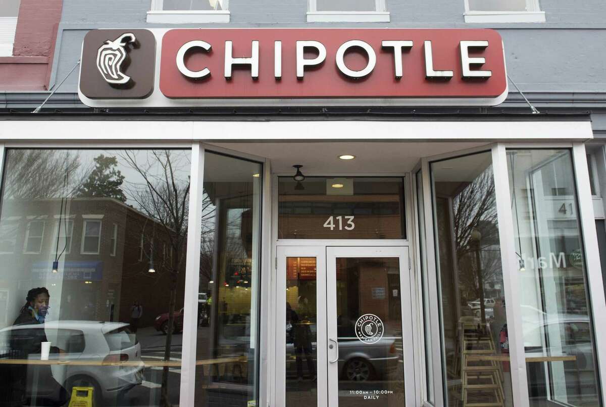 A Chipotle Mexican Grill restaurant is seen in Washington, DC, December 22, 2015. Chipotle shares tumbled on news that the Centers for Disease Control and Prevention (CDC) is investigating an outbreak of E. coli that may be unrelated to a previous one in November that led to 53 cases in nine states. AFP PHOTO / SAUL LOEBSAUL LOEB/AFP/Getty Images