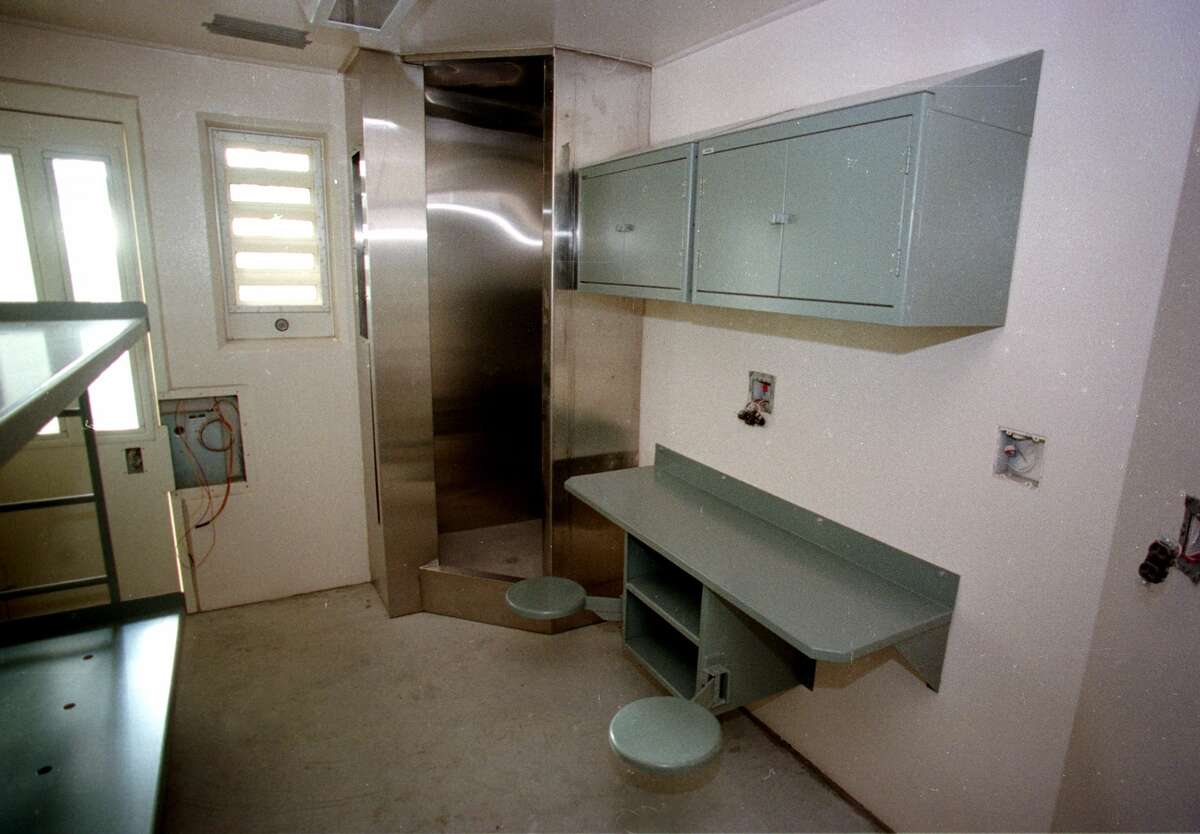 Interior of a solitary confinement jail cell under construction at the Five Points Correctional Facility, March 10, 2000, in Romulus, N.Y. The stainless steel shower stands in the corner of the solitary confinement prison cell with cupboards and a desk attached securely to on of the walls, right. (Steve Jacobs/Times Union)