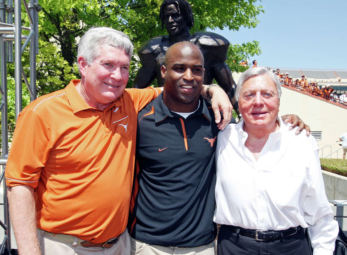Former UT player and 1998 Heisman Trophy winner Ricky Williams (center) poses for photos with Longhorns head coach Mack Brown (left) and Texas mega-donor Joe Jamail during the dedication of the Ricky Williams statue before the Orange-White scrimamge on April 1, 2012 at Royal-Memorial Stadium in Austin.