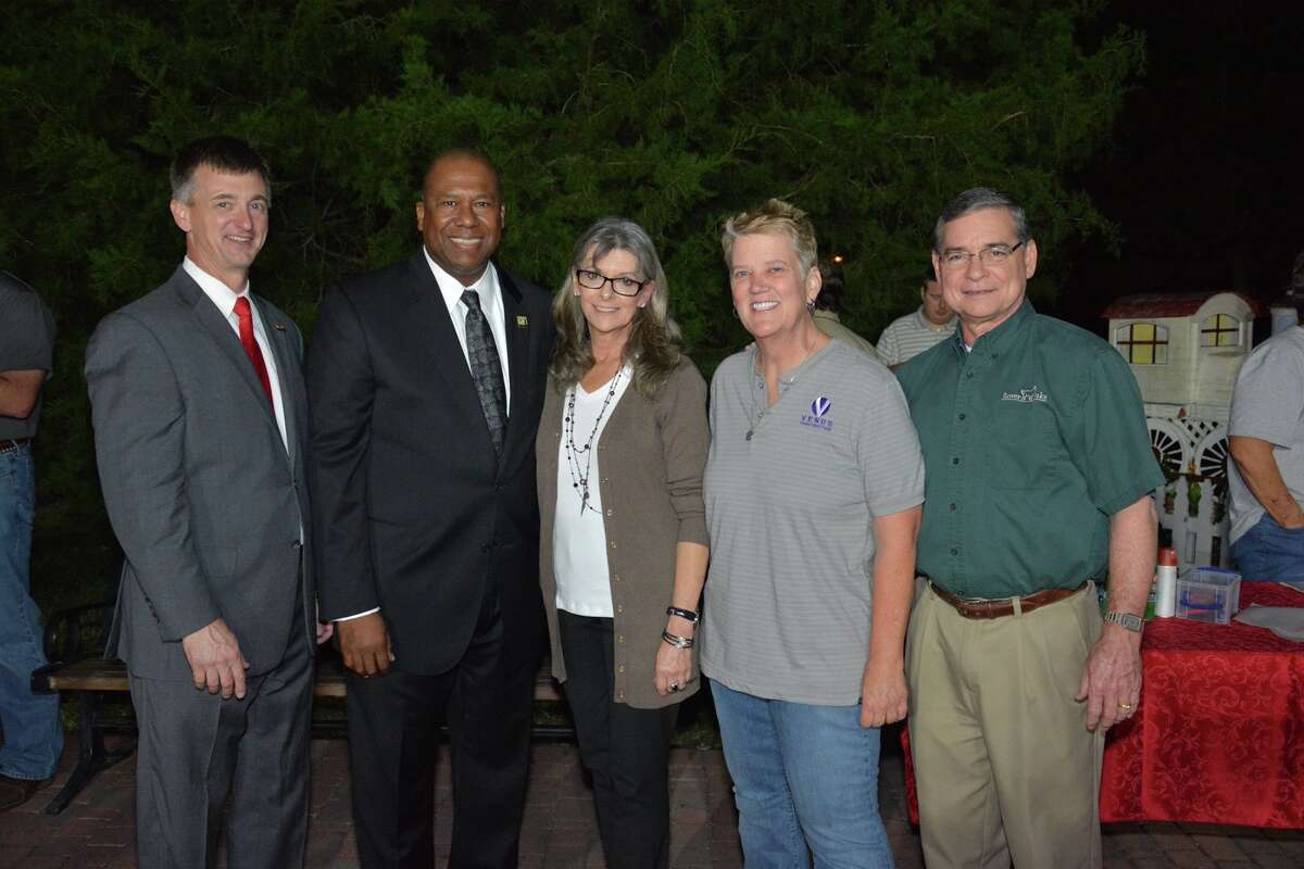 Katy ISD, along with Venus Construction, Rover Oaks Pet Resort and the Katy Heritage Society, celebrated the 2015 Katy ISD Campus Teachers of the Year recently at a special brick unveiling at Katy Heritage Park. From left are: Board of Trustees President Charles Griffin, Katy ISD Superintendent Alton Frailey, Katy Heritage Society board member Carol Adams, Venus Construction president Ida Franklin and Rover Oaks Pet Resort president Steve Smith.
