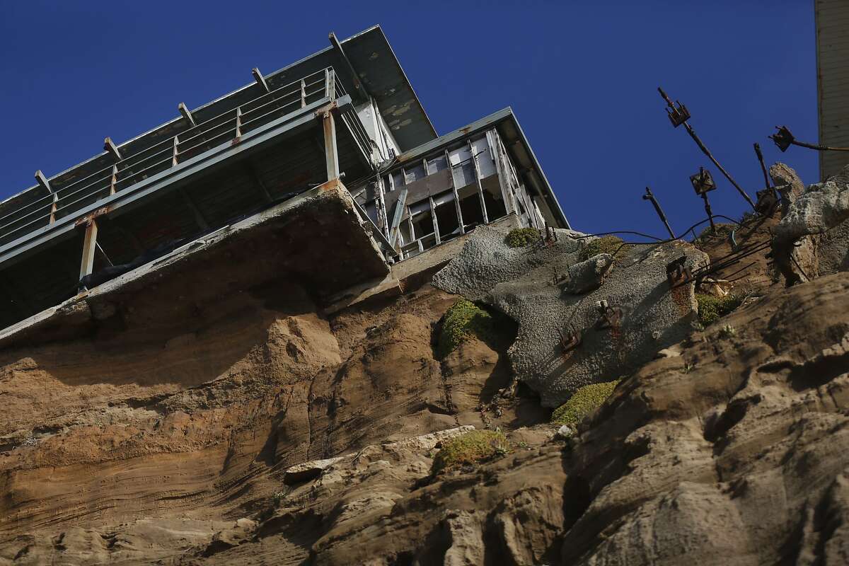 320 Esplanade Ave perches on the edge of an eroding cliff Dec. 23, 2015 in Pacifica, Calif. The property is vacant.