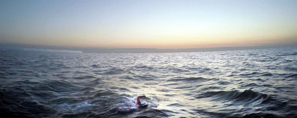 Andrew Altman swims the English Channel as the sun rises on Sept. 7. Altman and his two teammates swam the channel in nine hours and 50 minutes, making them the fastest men's relay team in 2015.