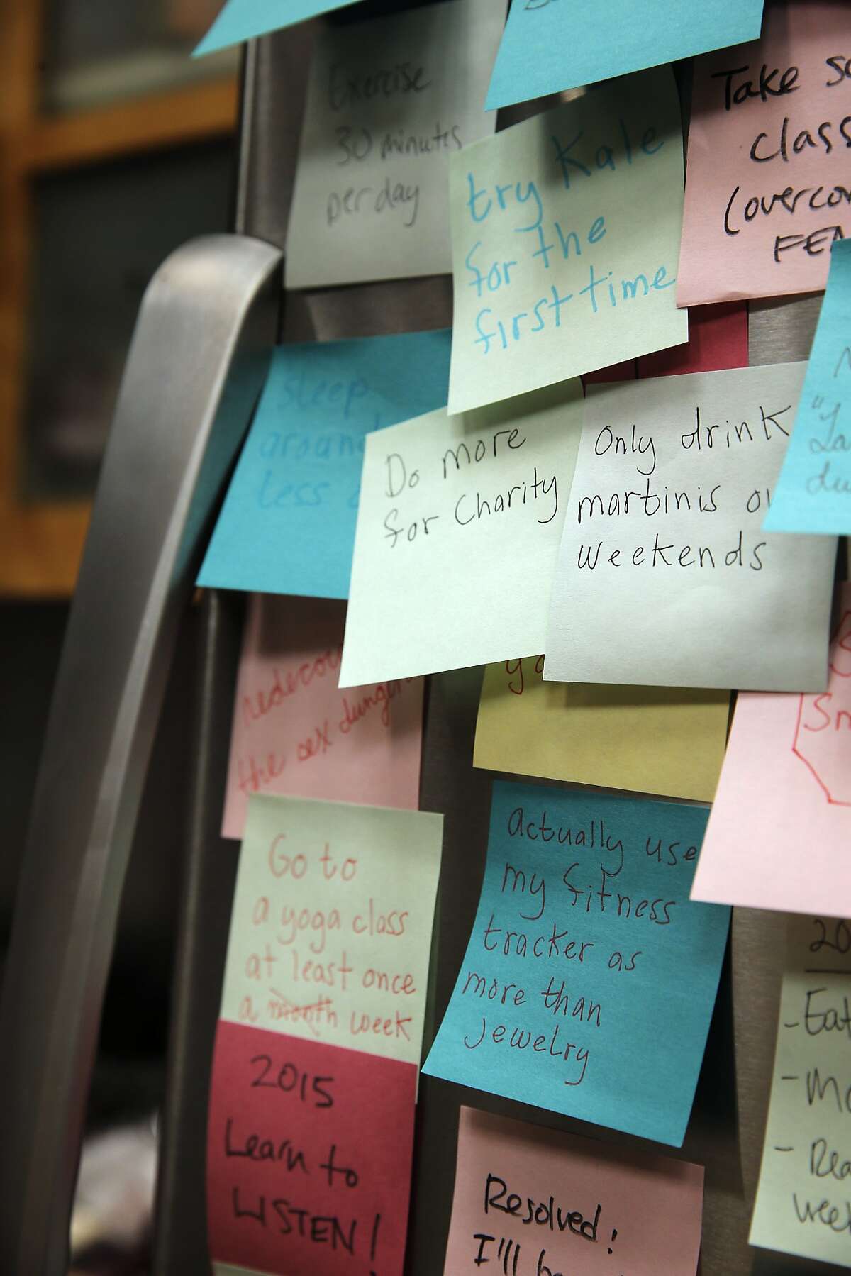 Photo illustration of post-it notes with New Year's resolutions in San Francisco, Calif., on Wednesday, December 23, 2015.