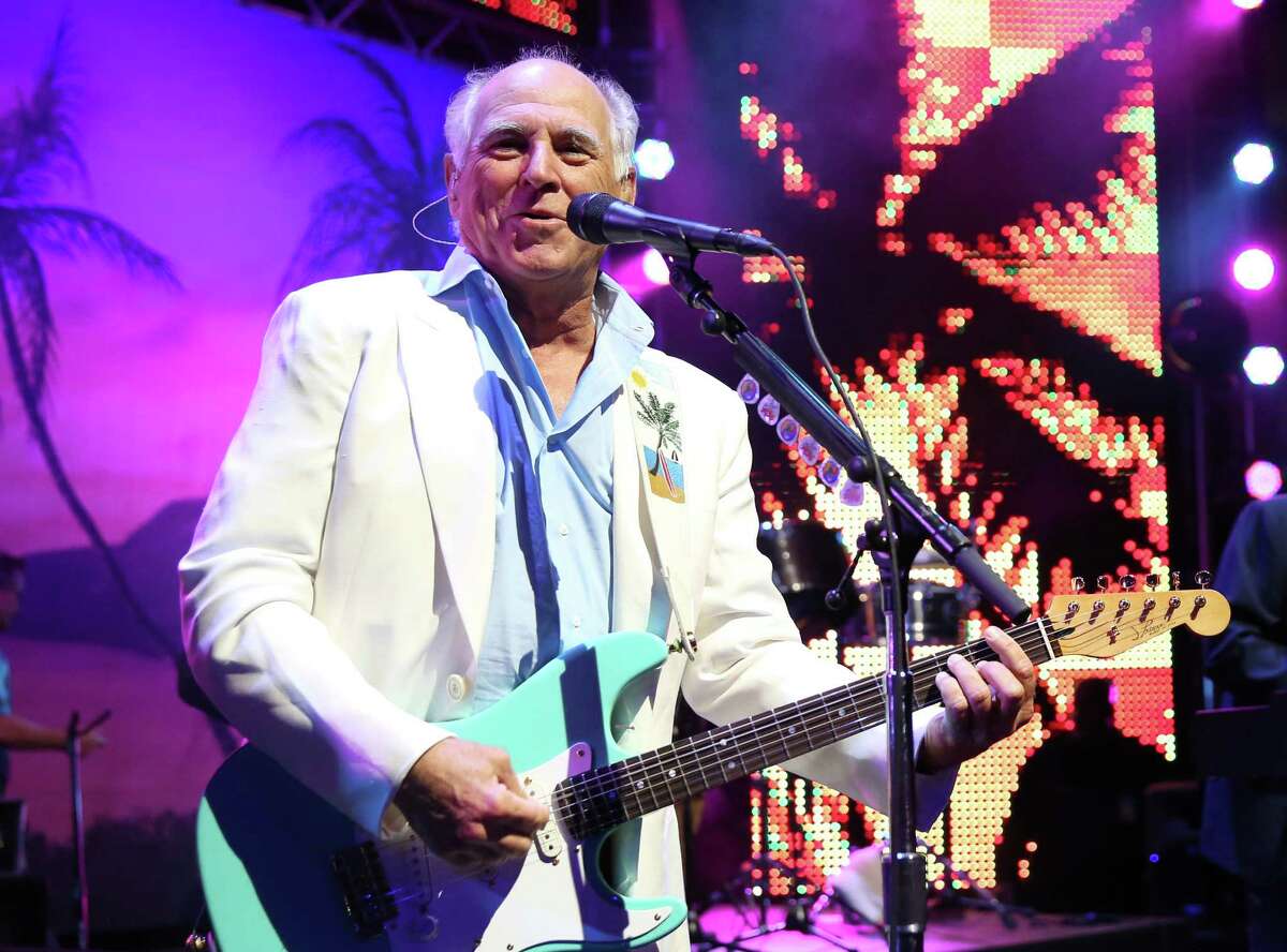 FILE - In this June 9, 2015 file photo, Jimmy Buffett performs at the after party for the premiere of "Jurassic World" in Los Angeles. Producers said Thursday, Dec. 17, that a planned Jimmy Buffet musical will have Buffett?’s blend of rock and country tunes and an original story by writers Greg Garcia and Mike O?’Malley. A world premiere production is expected to be announced for 2017. (Photo by Matt Sayles/Invision/AP, File) ORG XMIT: NYET402