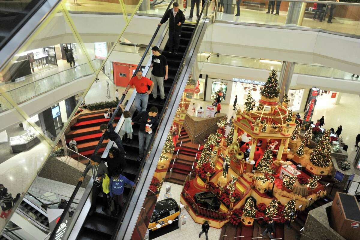 Stamford Town Center was buzzing with hundreds of last-minute shoppers on Christmas Eve.