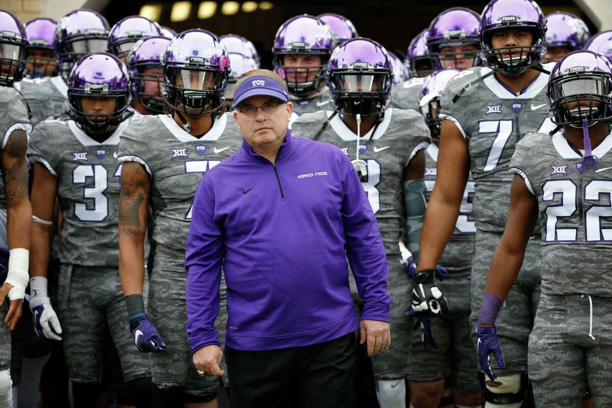 TCU head coach Gary Patterson and his team wait before TCU takes on Kansas on Nov. 14, 2015, in Fort Worth.