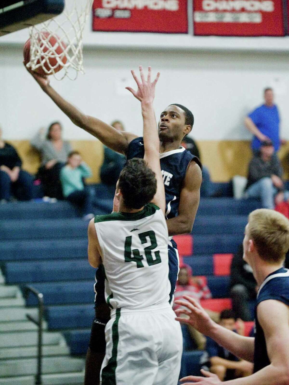 Immaculate High School's Darius Hunter goes to the basket in the Candlewood Classic boys basketball tournament against New Milford High School, played at New Fairfield High School. Saturday, Dec. 26, 2015